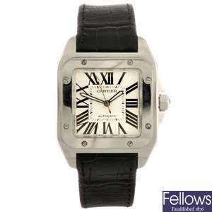 A stainless steel automatic Cartier Santos wrist watch.