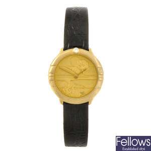 A 14k gold quartz lady's wrist watch.
