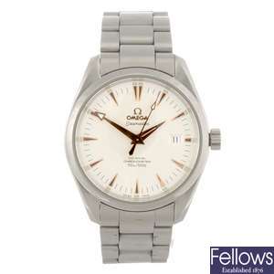 A stainless steel automatic gentleman's Omega Seamaster bracelet watch.