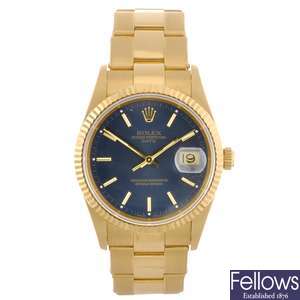 An 18k gold automatic gentleman's Rolex Oyster Perpetual Date bracelet watch.
