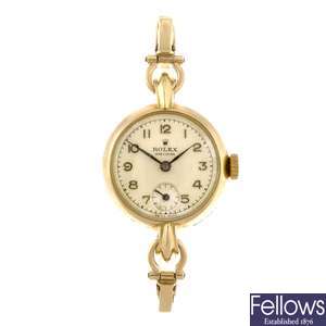 A 9ct gold manual wind lady's Rolex bracelet watch.