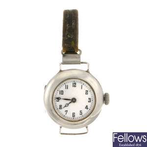 A silver manual wind Rolex wrist watch.