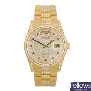 An 18k gold diamond set Rolex Day-Date bracelet watch.