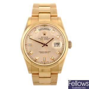 (108067) An 18k gold automatic gentleman's Rolex Day-Date bracelet watch.