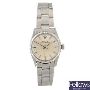 A stainless steel automatic mid-size Rolex Oyster-Perpetual bracelet watch.