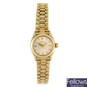 A 9ct gold automatic lady's Rolex Oyster Perpetual bracelet watch.