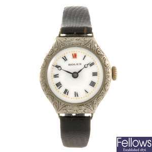 A white gold filled manual wind lady's Rolex wrist watch.