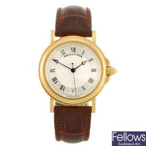 An 18k gold automatic gentleman's Breguet wrist watch.