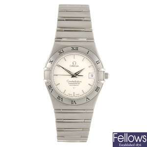 A stainless steel automatic gentleman's Omega Constellation bracelet watch.