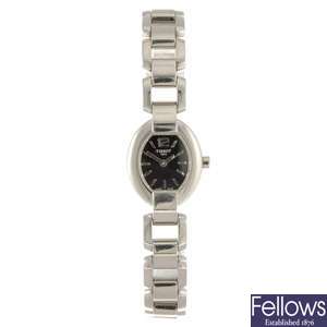 A stainless steel quartz lady's Tissot bracelet watch.