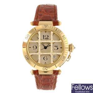 An 18k gold automatic Cartier Pasha wrist watch.