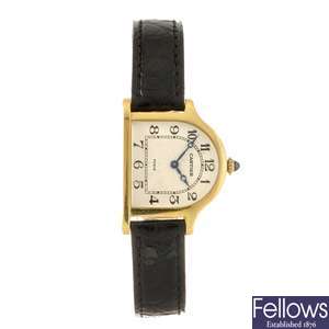 An 18k gold manual wind Cartier Cloche limited edition wrist watch.