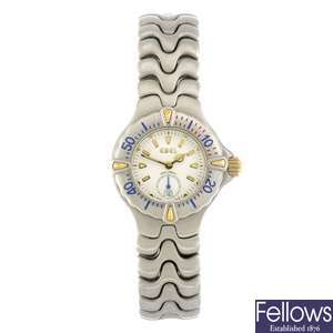 A stainless steel quartz lady's Ebel Sportwave wrist watch.