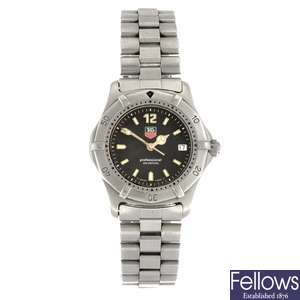 (811006115) A stainless steel quartz mid-size Tag Heuer 2000 Series bracelet watch.