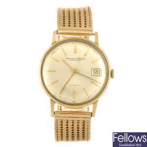 (128935917) An 18k gold automatic gentleman's IWC bracelet watch.