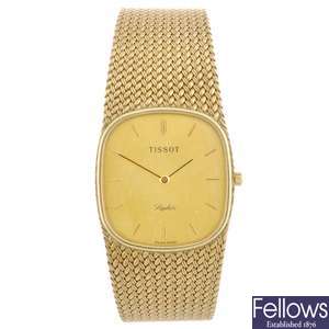 (301152797) A 9ct gold quartz gentleman's Tissot bracelet watch.