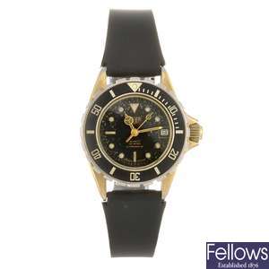 A gold plated quartz lady's Heuer 1500 Series wrist watch.