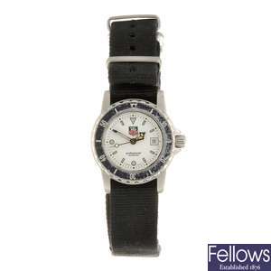 A stainless steel quartz lady's Tag Heuer 1500 Series wrist watch.