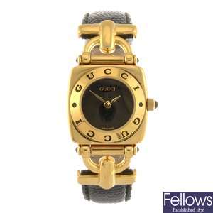 (108107708) A gold plated quartz lady's Gucci 6300L wrist watch.