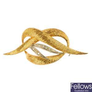 An 18ct gold diamond knot brooch.