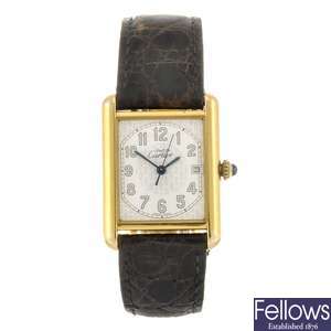 (6711) A gold plated silver quartz Cartier Must de Cartier wrist watch.