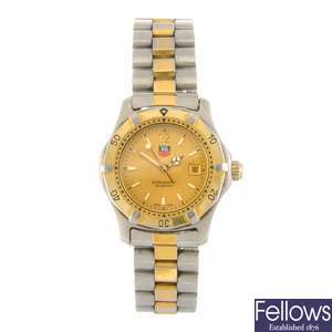 (704009621) A bi-colour quartz lady's Tag Heuer 2000 Series bracelet watch.