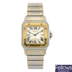 (304294776) A bi-metal quartz Cartier Santos bracelet watch.