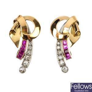 A pair of 1950s gold diamond and ruby ear studs.