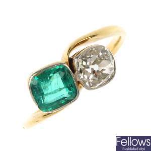 A mid 20th century 18ct gold diamond and emerald crossover ring.