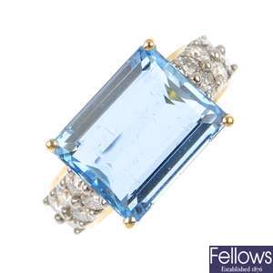 An 18ct gold aquamarine and diamond dress ring.