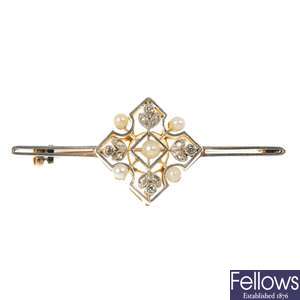 An early 20th century gold diamond and seed pearl bar brooch. 