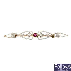 A mid 20th century 14ct gold and platinum ruby and diamond brooch.