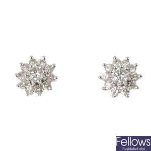 A pair of 18ct gold diamond cluster ear studs. 