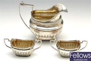 A George III silver cream jug & Edwardian silver salts.