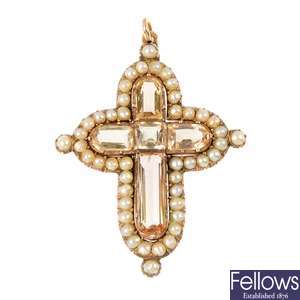 A late 19th century gold topaz and split pearl cross pendant. 