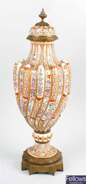 An unusual 19th century porcelain gilt metal mounted vase