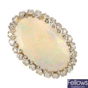 An opal and diamond ring.