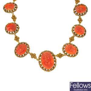 A mid 19th century gold coral cameo necklace.