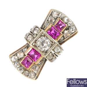 A diamond and synthetic ruby stylised bow ring.