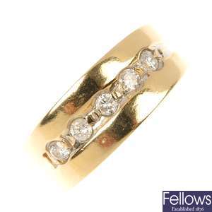 A diamond five-stone band ring. 