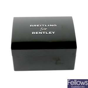 A pair of Breitling watch boxes.