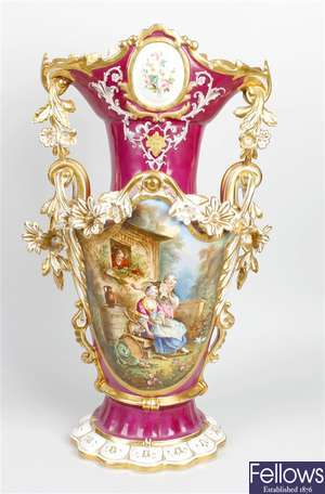 A large 19th century painted porcelain vase