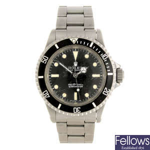 ROLEX - a gentleman’s Oyster Perpetual Submariner bracelet watch with helium escape valve.