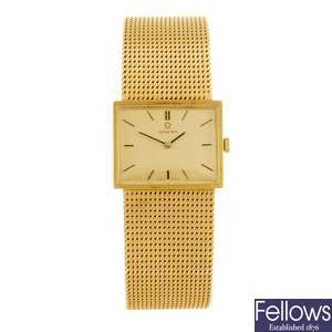 (935001583) An 18k gold manual wind gentleman's Omega bracelet watch.