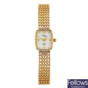 (1109015572) A 14k gold quartz lady's Michael Anthony bracelet watch.