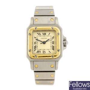 (307093581) A bi-metal automatic Cartier Santos bracelet watch.