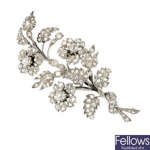 A diamond floral spray brooch.