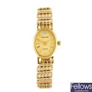 (609025540)  A 9k gold quartz lady's Accurist bracelet watch.