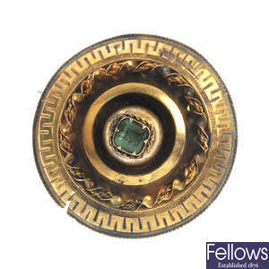 A late Victorian 18ct gold emerald target brooch, circa 1880. 