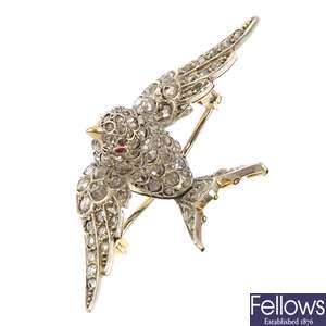 A mid 20th century diamond and ruby swallow brooch.